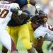 Central Michigan linebacker Nathan Rickets loses his helmet during the play in the second half at Michigan Stadium on Saturday, August 31, 2013. Melanie Maxwell | AnnArbor.com